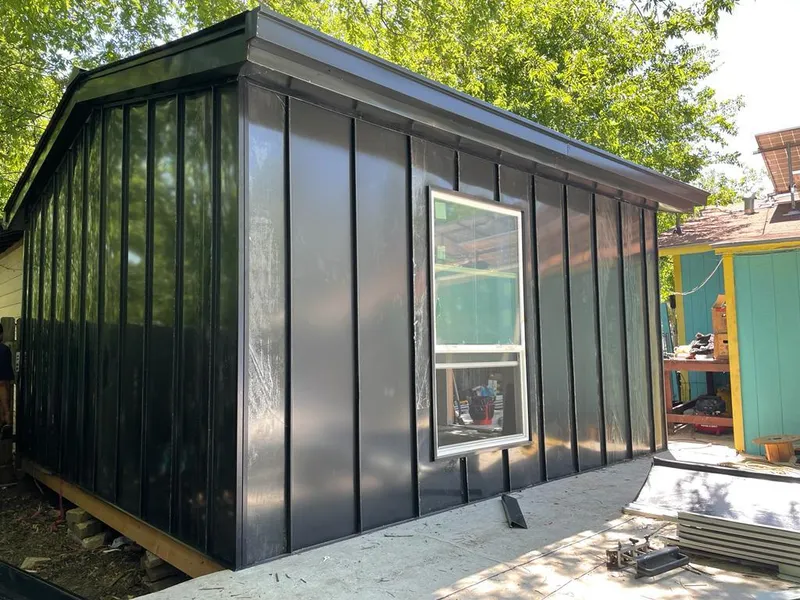 Black standing seam metal wall panels for Roof Inspection in Naranja